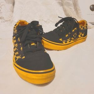 Black and yellow old school vans